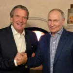 Merz je pobúrený Schröderovou návštevou Putina, oslavu označil za nemorálnu